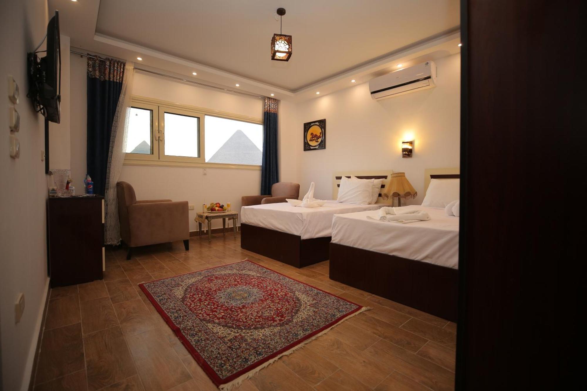 Hussien Lotus Pyramids View Hotel Cairo Exterior foto